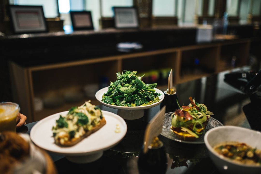 Assorted Vegetarian Delicacies Displayed on Elegant Countertop