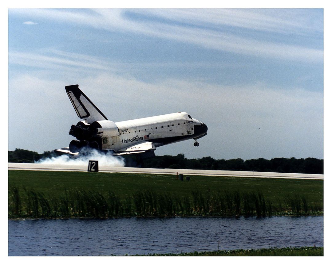 Space Shuttle Columbia Landing at Kennedy Space Center on April 8, 1997 - Free Images, Stock Photos and Pictures on Pikwizard.com