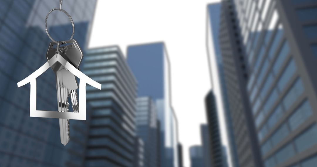 House Key on Keychain Against Urban Skyline