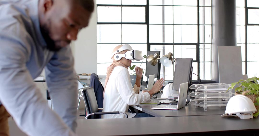 Hijab-Wearing Woman Using VR in Office for Innovative Collaboration