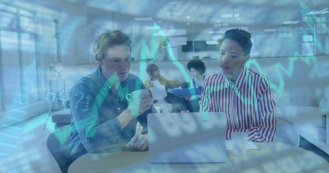 Financial Analysts Collaborating in Modern Office with Data Overlay