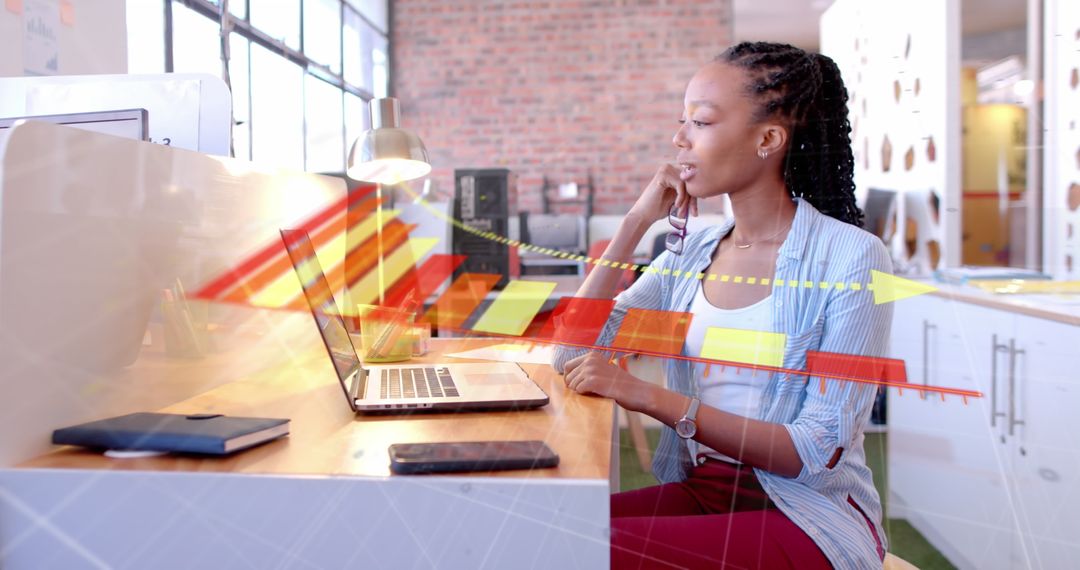 Focused Businesswoman Analyzing Data with Diagram Overlay