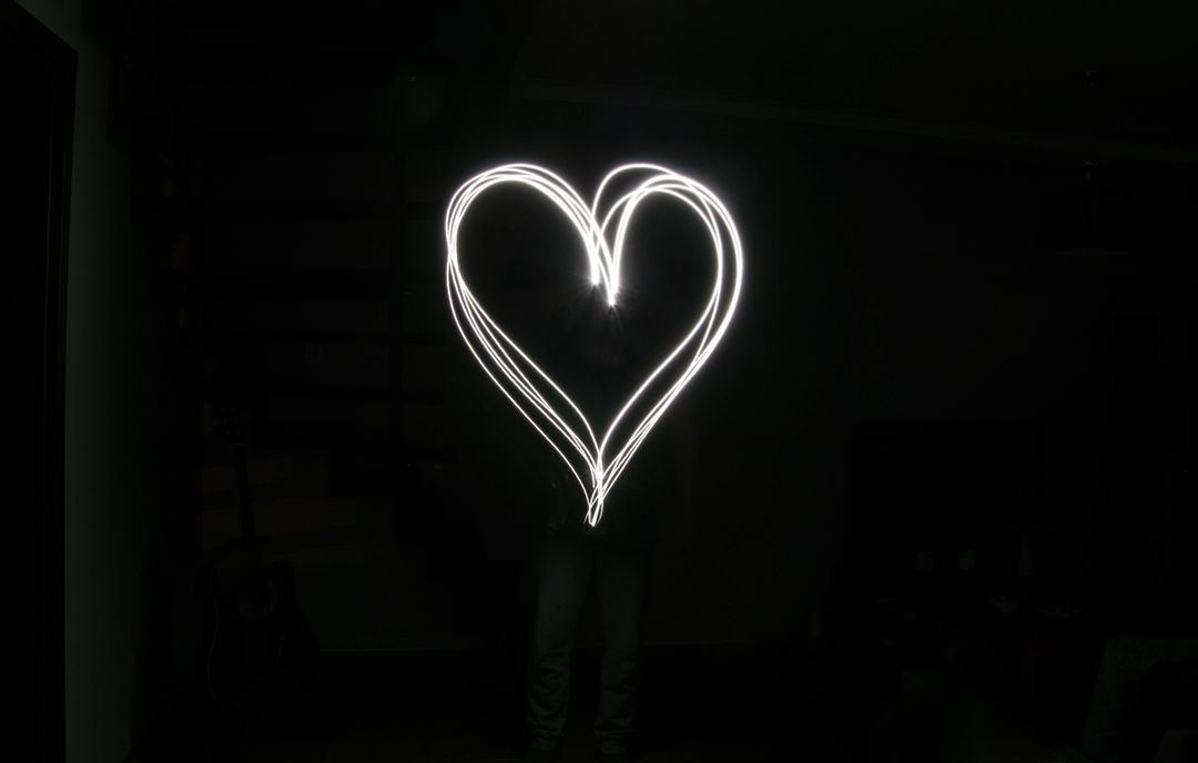 Light Painting Heart Shape in Dark Room - Free Images, Stock Photos and Pictures on Pikwizard.com
