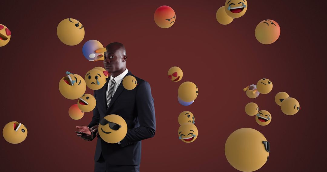 Businessman in Suit Encircled by Floating Emojis with Smartphone