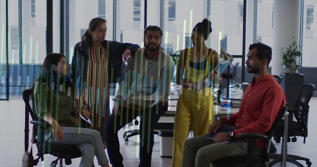 Collaborative Team Analyzing Bar Chart In Modern Office