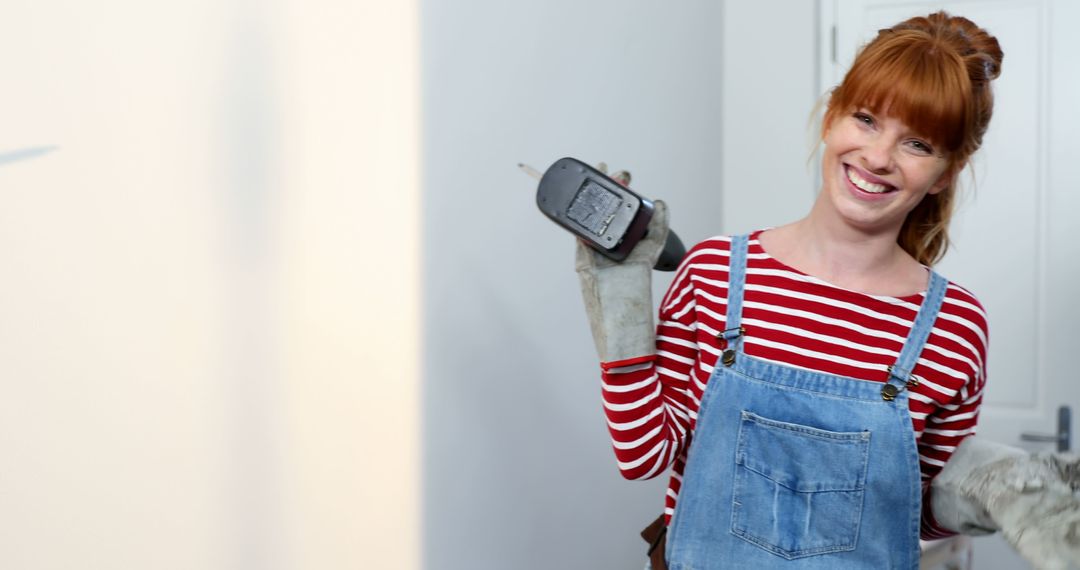 Energetic Young Woman Radiates DIY Enthusiasm in Home Renovation - Free Images, Stock Photos and Pictures on Pikwizard.com