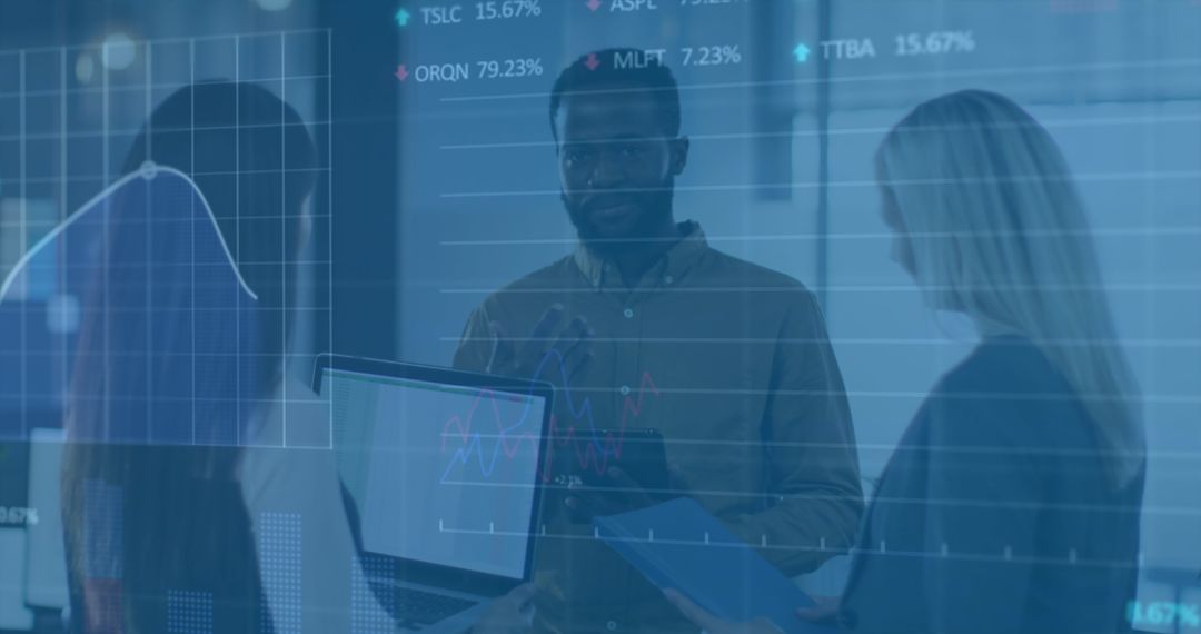 Diverse Professionals Analyzing Digital Financial Charts in Modern Office