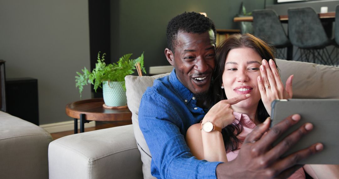 Happy Couple Announcing Engagement with Joyful Video Call