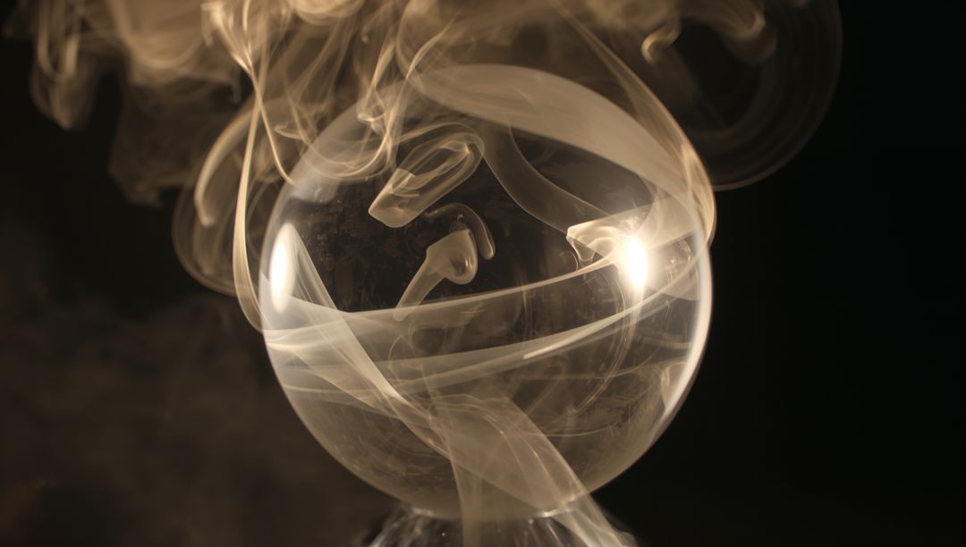 Mystical Transparent Sphere with Enveloping Swirling Smoke