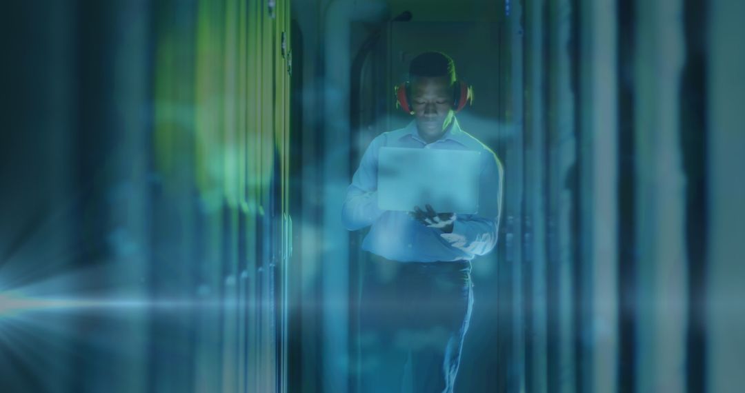 IT Technician Working in Futuristic Data Center