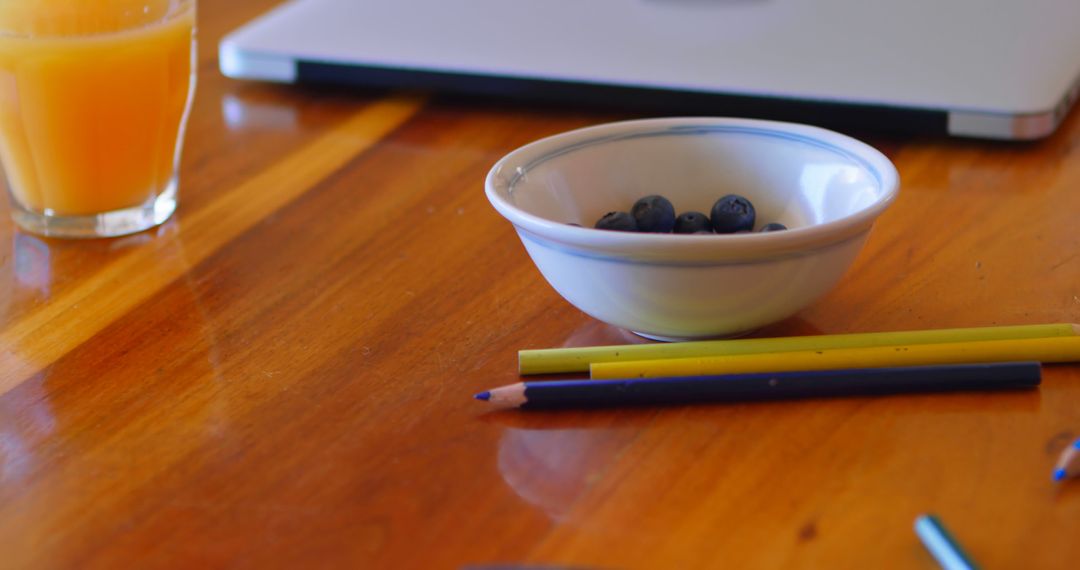 Healthy Breakfast with Blueberries and Juice on Wooden Table - Free Images, Stock Photos and Pictures on Pikwizard.com