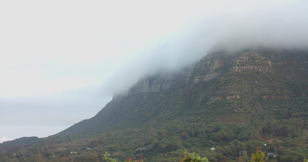 Misty Mountain With Cloud-Covered Limestone Cliffs