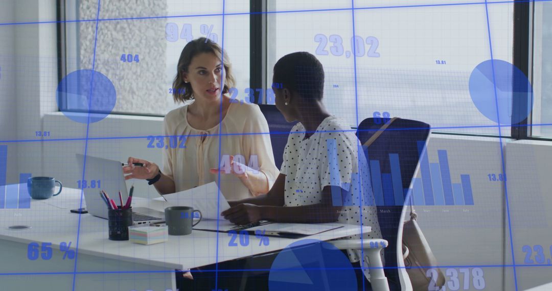 Colleagues Collaborating on Data Analysis with Digital Graphs