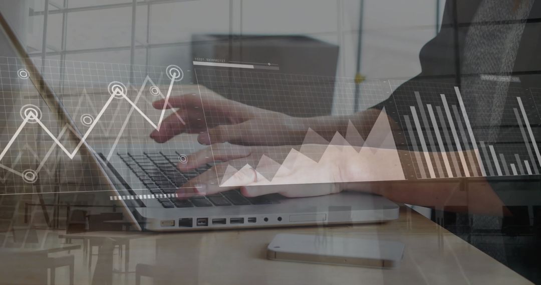 Businesswoman Using Laptop with Financial Data Overlay
