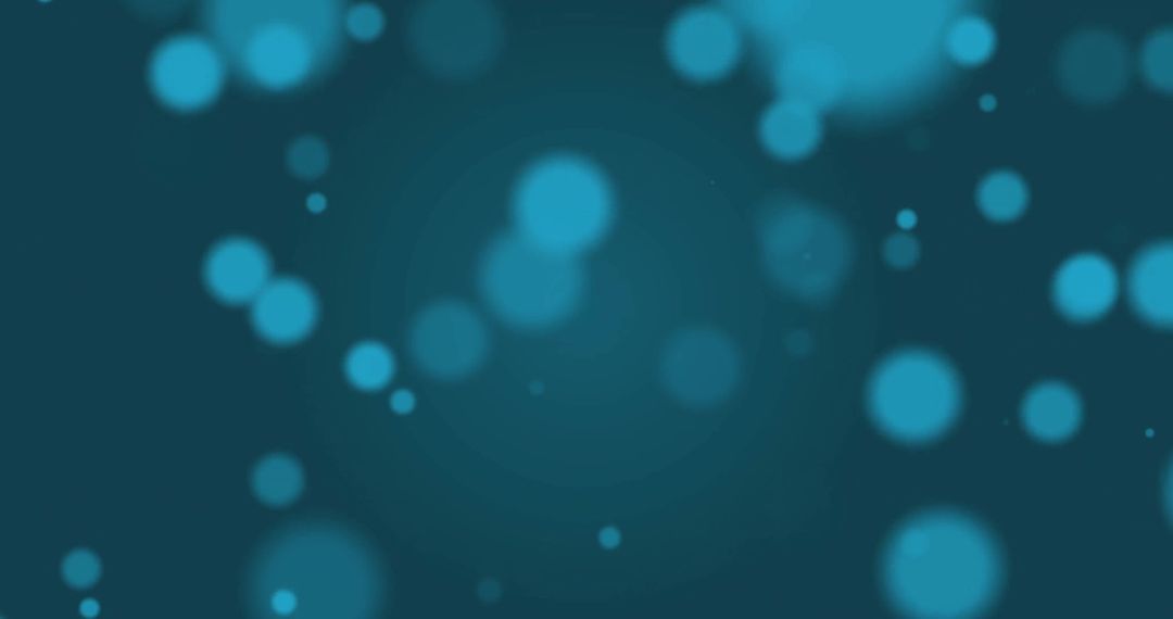 Abstract Glowing Lights on Blue Bokeh Background