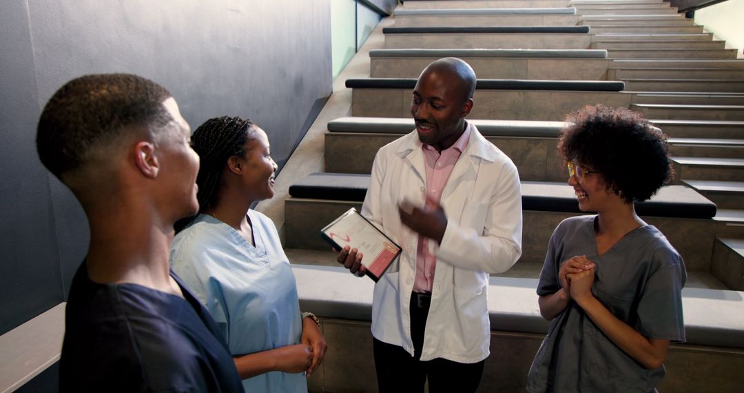 Diverse Healthcare Team Celebrating Success with Certificate