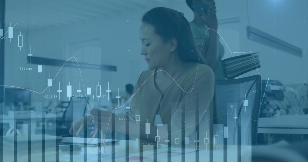 Businesswoman Analyzing Data with Futuristic Graph Overlays