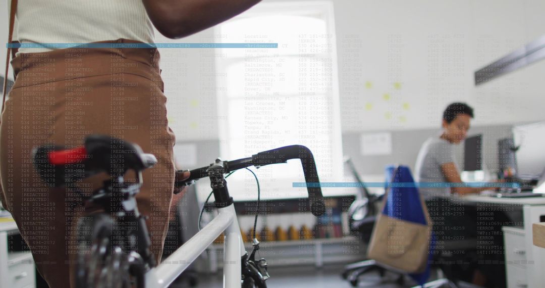 Professional in Open Office with Bicycle, Embracing Modern Work Culture