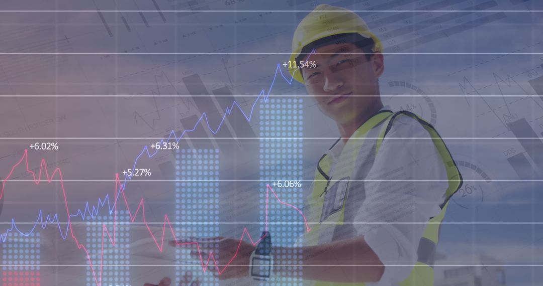Engineer Analyzing Graphs on Construction Site