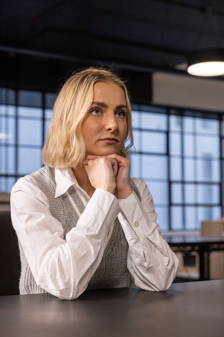 Businesswoman in Modern Office with Natural Light