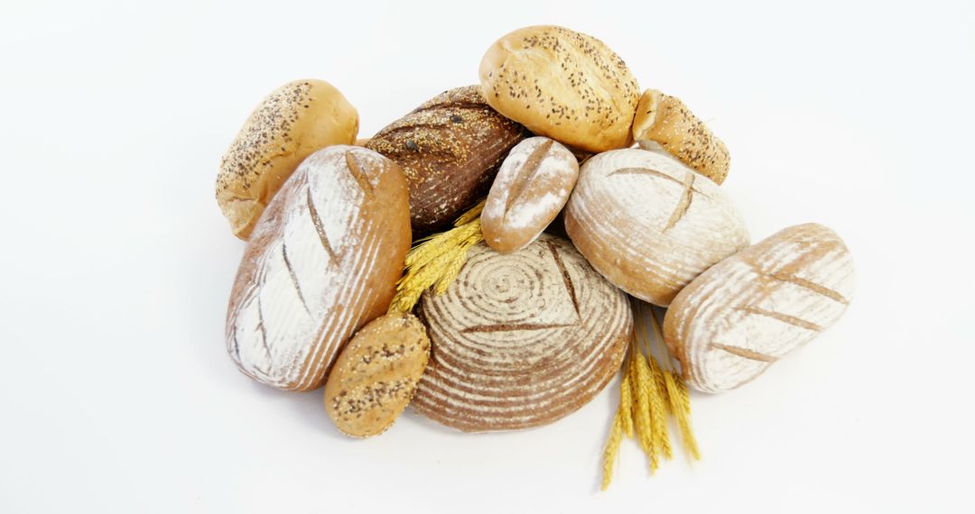 Assorted Fresh Artisan Bread Loaves Isolated on White Background - Free Images, Stock Photos and Pictures on Pikwizard.com