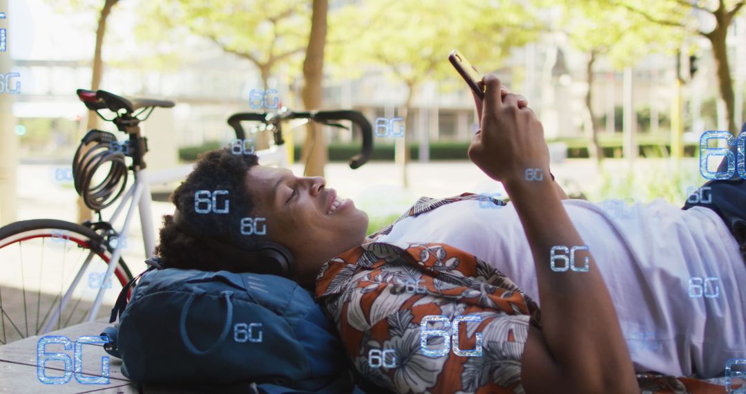 Man Using Smartphone with 6G Graphics Outdoors