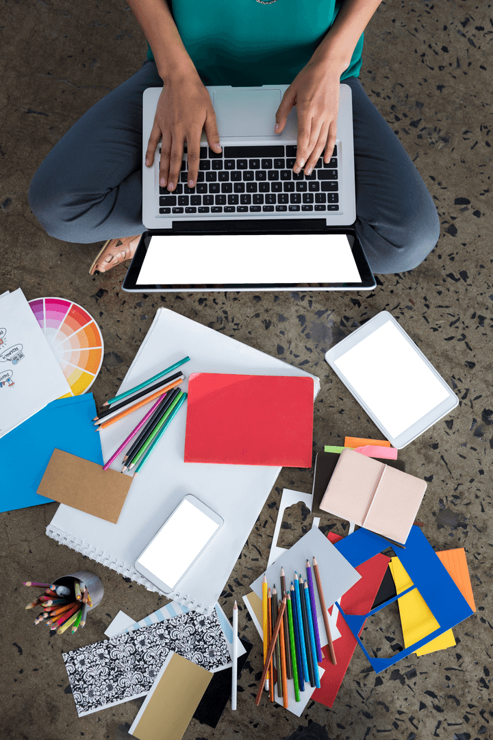 Woman Sitting with Laptop and Design Tools on Transparent Surface