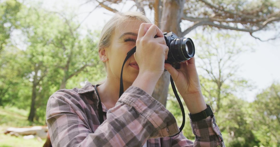 Young Woman Taking Nature Photos in Forest - Free Images, Stock Photos and Pictures on Pikwizard.com