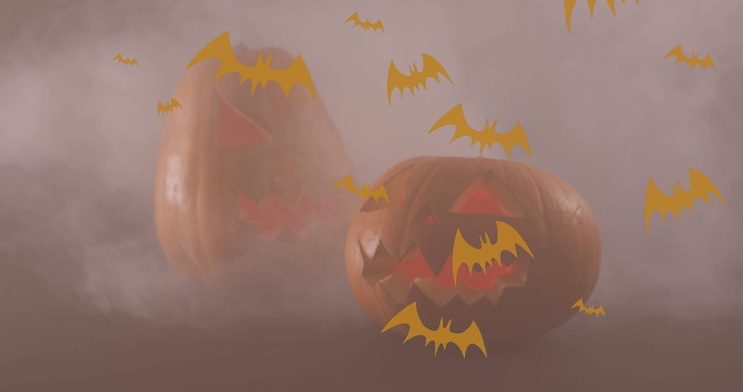 Jack-o'-Lanterns with Bat Silhouettes in Smoky Background
