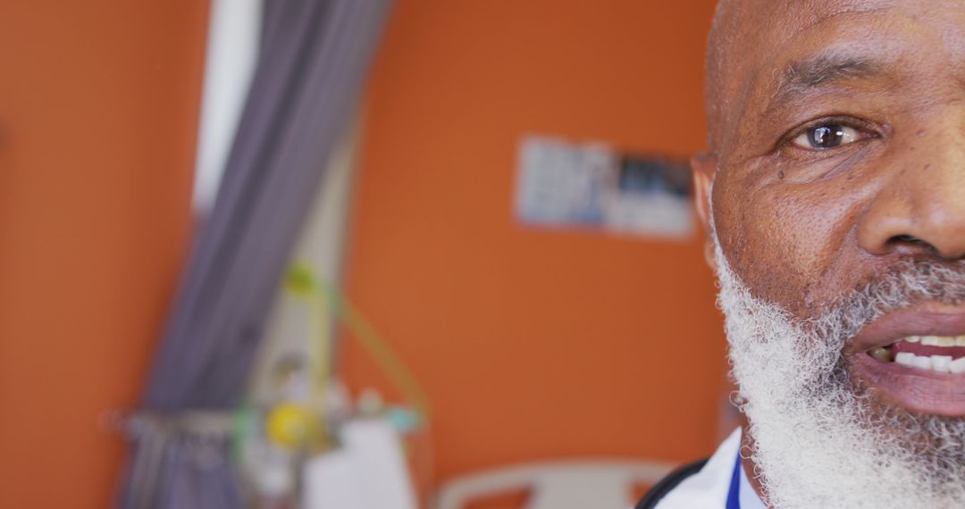 Close-up of Elderly Doctor with Beard in Hospital Room - Free Images, Stock Photos and Pictures on Pikwizard.com