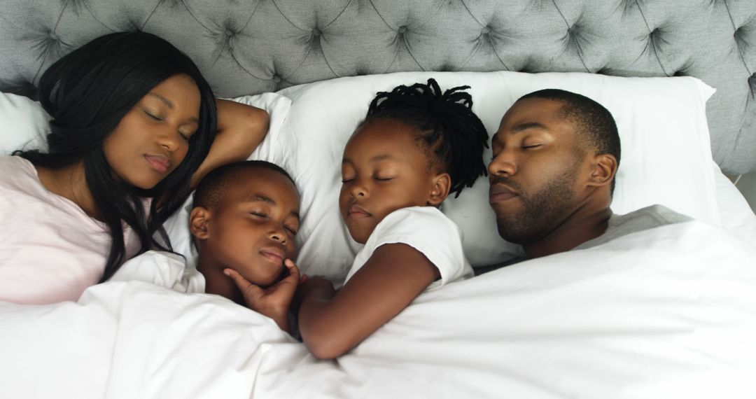 African American Family Sleeping Peacefully Together Emphasizing Bond and Comfort - Free Images, Stock Photos and Pictures on Pikwizard.com