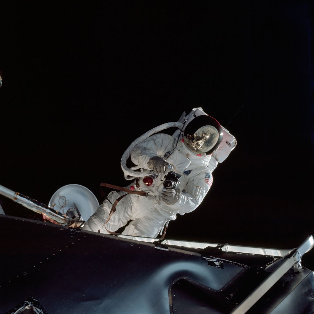 Apollo 9 Astronaut Performing Extravehicular Activity with Camera - Free Images, Stock Photos and Pictures on Pikwizard.com