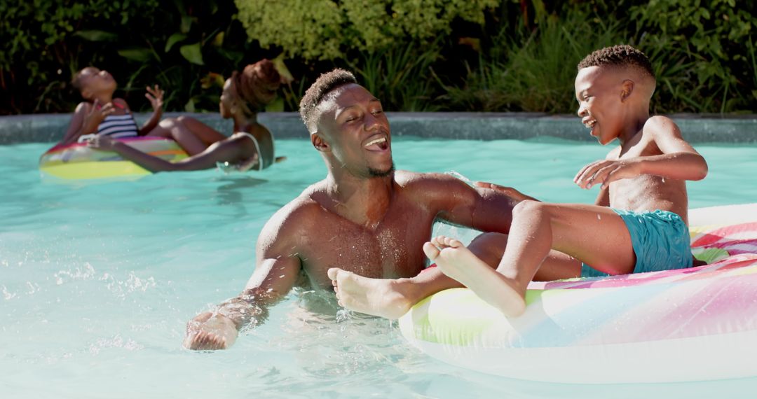 Father and Son Bonding in Pool on Inflatable Float