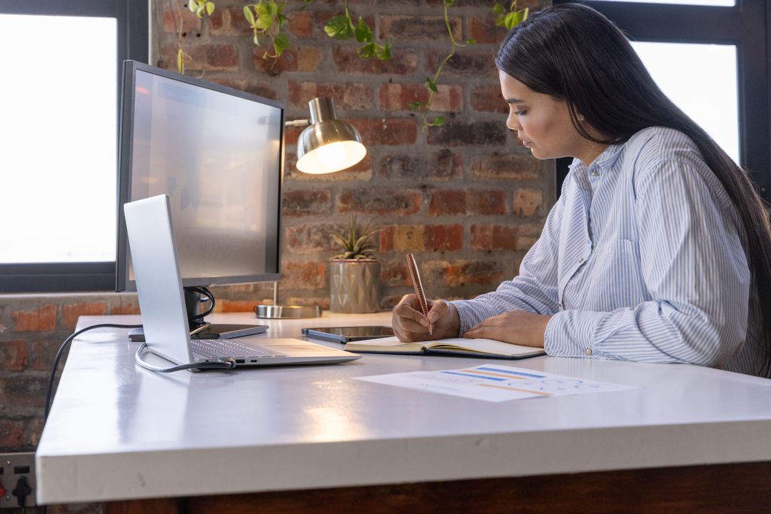 Woman Analyzing Data in Home Office with Modern Minimalist Decor
