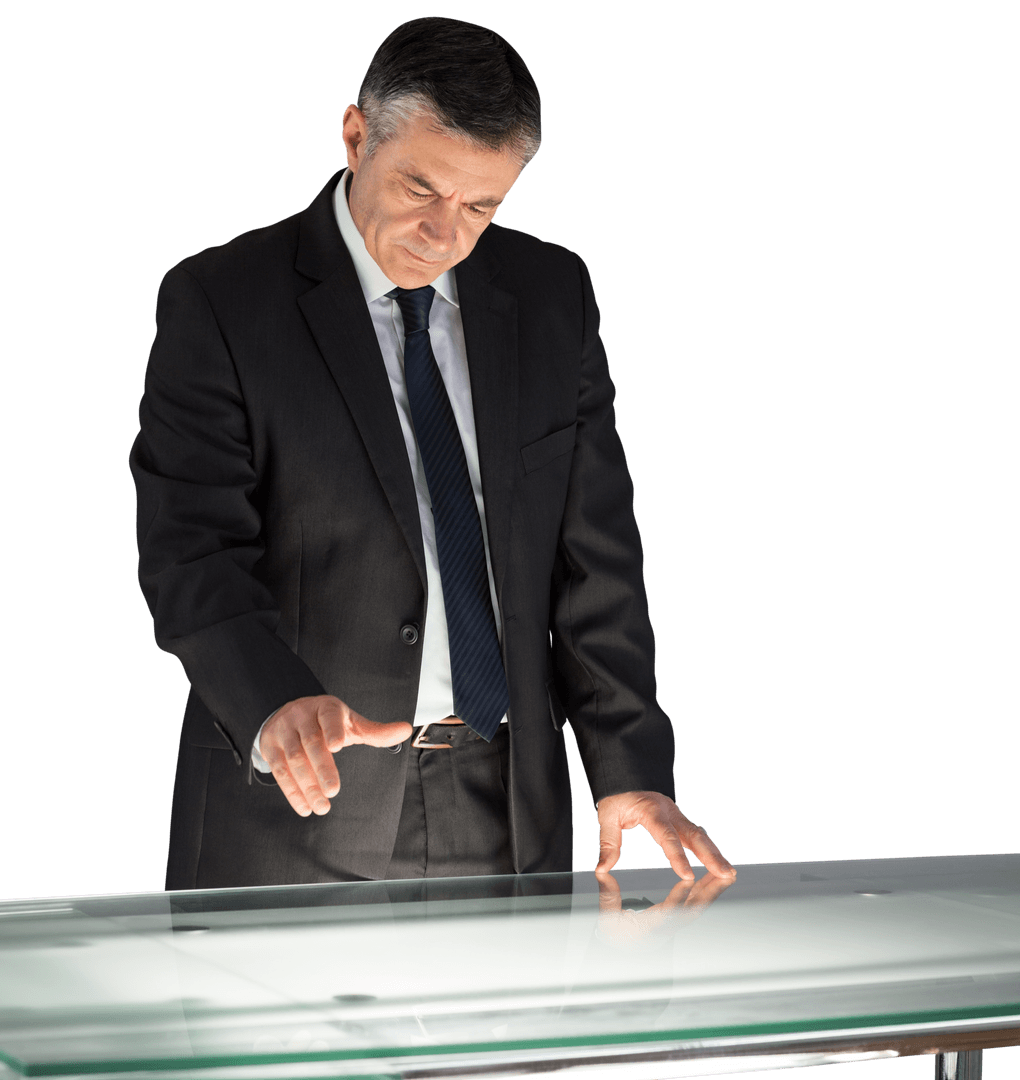 Mature Businessman Using Transparent Interactive Desk for Technology Presentation