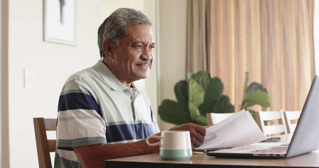 Senior Man Working on Financial Documents at Home - Free Images, Stock Photos and Pictures on Pikwizard.com