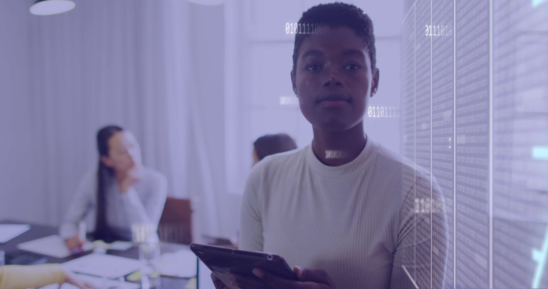 Confident Businesswoman Using Tablet for Data Analysis in Modern Office
