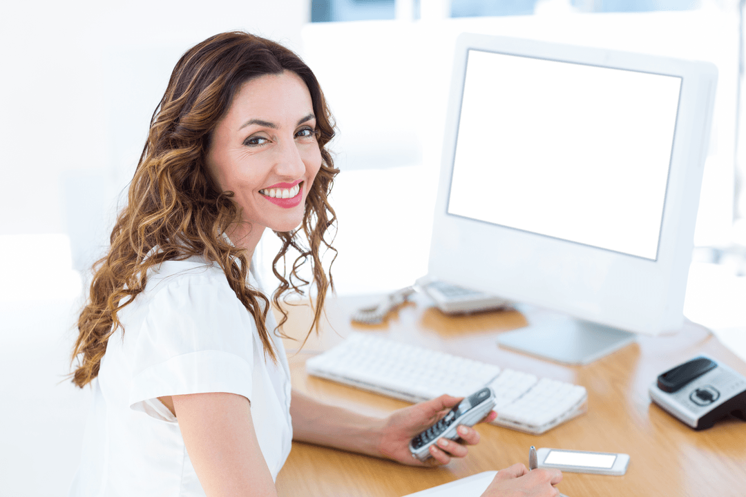 Smiling Businesswoman Using Technology in Bright Office Transparent Screen