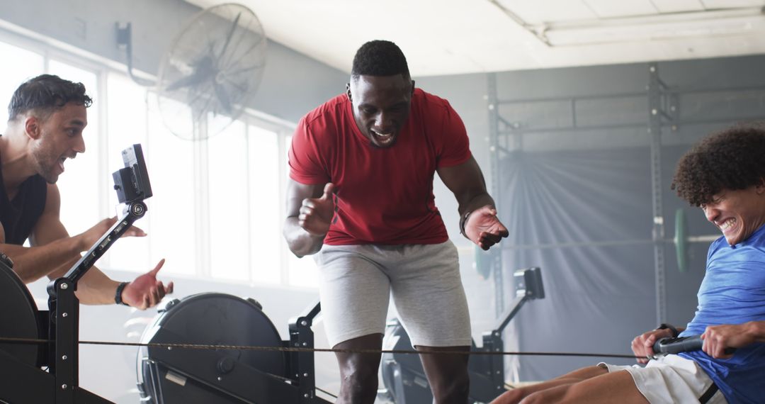 Motivated Rowing Workout with Coaching in Modern Gym