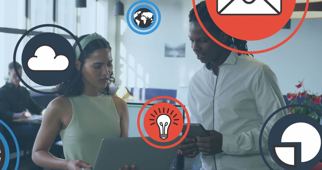 Coworkers Brainstorming in Modern Office with Technology Icons