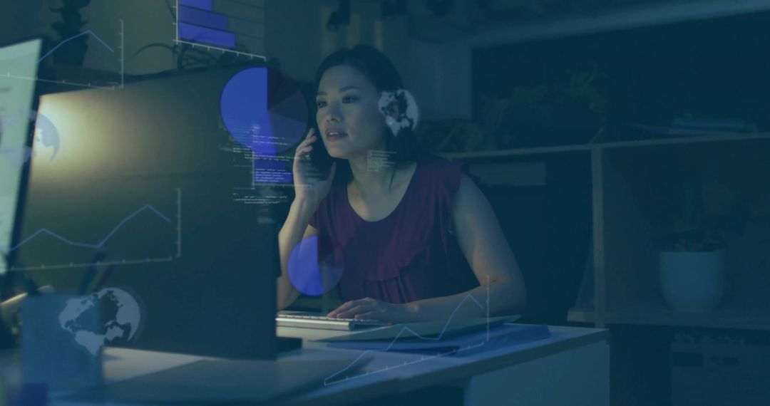 Professional Woman Using Technology in Modern Office with Data Overlays