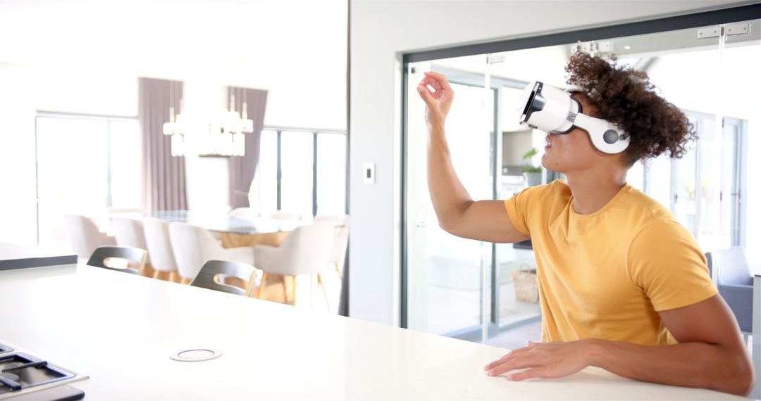 Young Person Experiencing Virtual Reality in Modern Kitchen