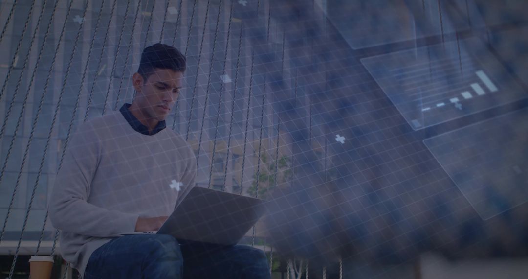 Professional Man with Laptop Relaxing in Modern Lounge Seating Area