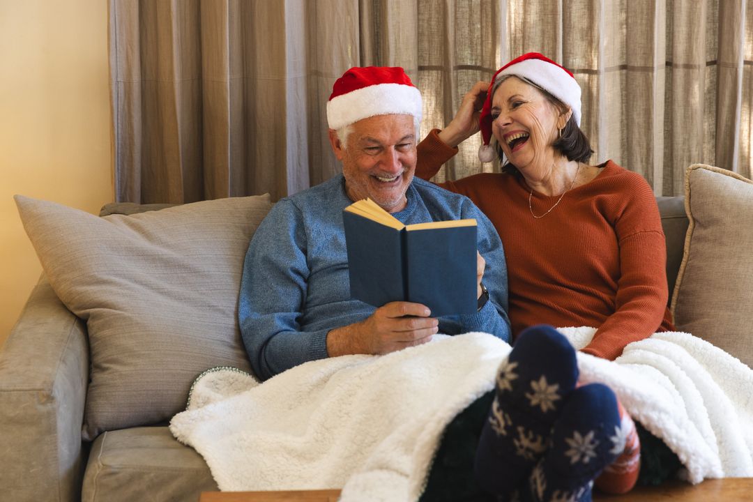 Senior Couple Enjoying Cozy Winter by Reading Together