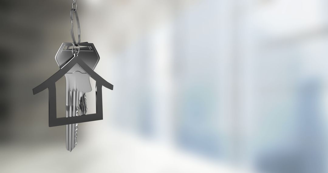 House Keys with Keychain Suspended in Bright Room