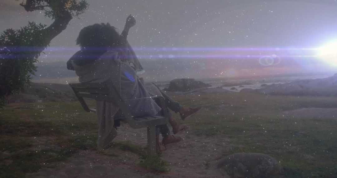 Couple Embracing on Coastal Park Bench Under Starry Sky