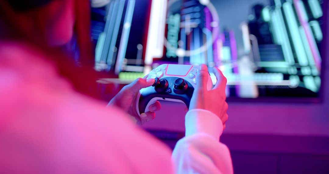 Teenage Girl Immersed in Video Game Playing with Controller