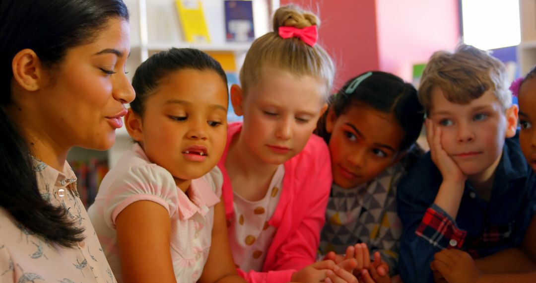 Teacher Engaging Handcrafted Curriculum Activities with Young Students