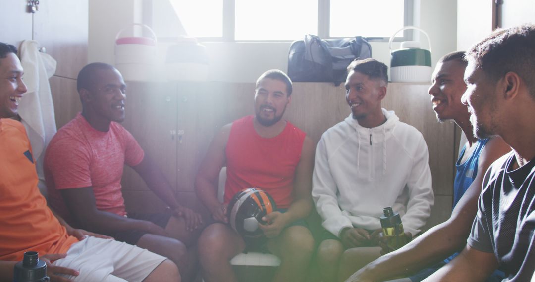 Diverse Football Players Discussing Game in Locker Room