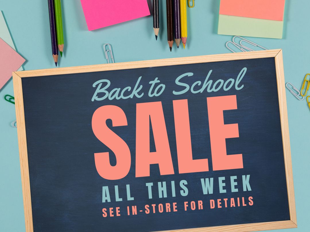 Back to School Sale Advertisement on Chalkboard